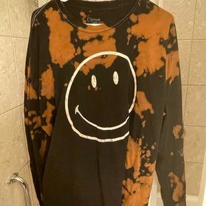 Black and orange pacsun smiley face tee